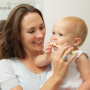 baby brushing teeth.