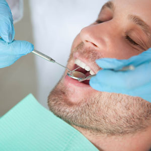 DontNeglectOfficeCleaningswithDentalImplants