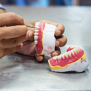 TheresaLotofEffortBehindtheScenestoMakingDenturesWorkforYou