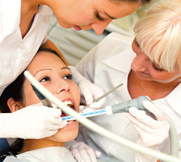What tools do dentists use to clean teeth?