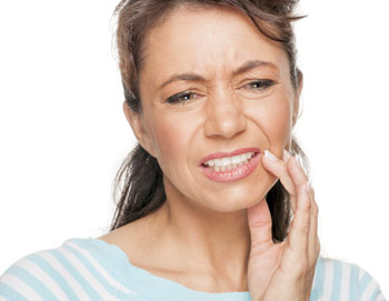 Woman experiencing tooth Pain.