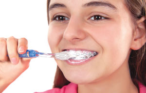 Brushing teeth with braces.