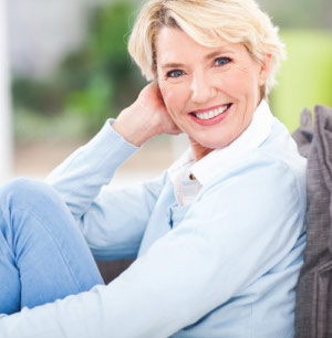 Woman with flexible partial dentures.