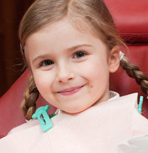 Child in dental chair.