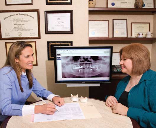 Dr. Jessica Logan talking to patient.